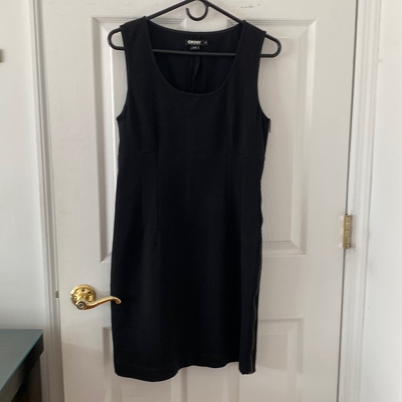 Dkny Dresses & Skirts - DKNY black sleeveless dress. Size 8. Rounded neck. Full side zipper. PTP abt 19